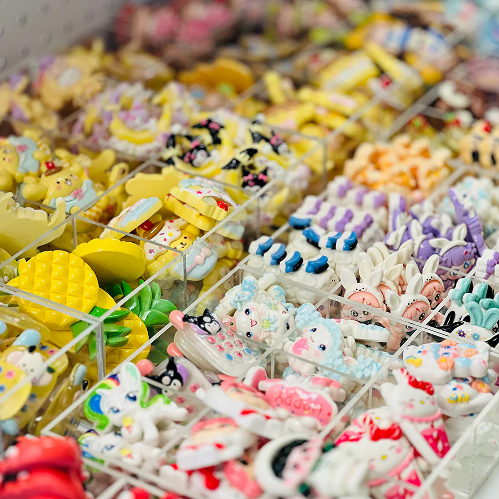 Rainbow character bead & charm display at Craftify DIY Studio, a Craft Store in Bloomington